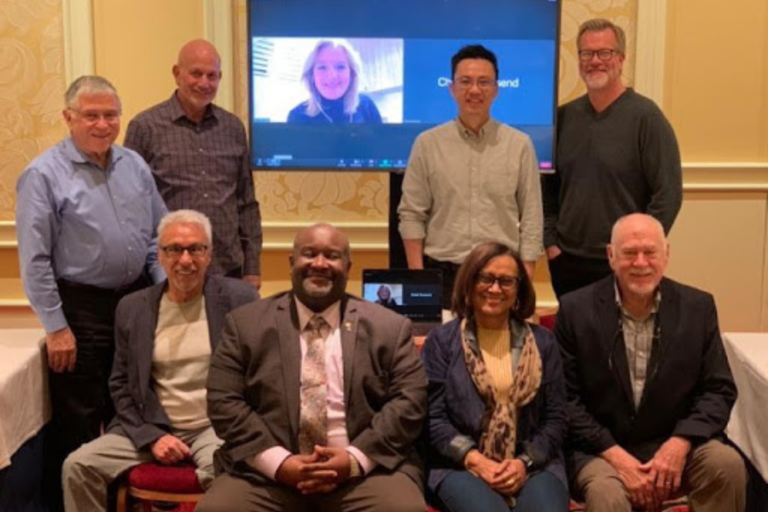 A photo of the IACFP Board including: Front Row (left to right): Frank Porporino, Melvin Hinton, Diane Williams, Dick Althouse Back Row (left to right): Jim DeGroot, Jeffrey Metzner, Emma Regan, Gabriel Ong, Matt Epperson