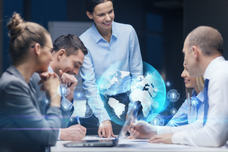 A picture of team meeting with an illustration of a globe and connectivity over the image.